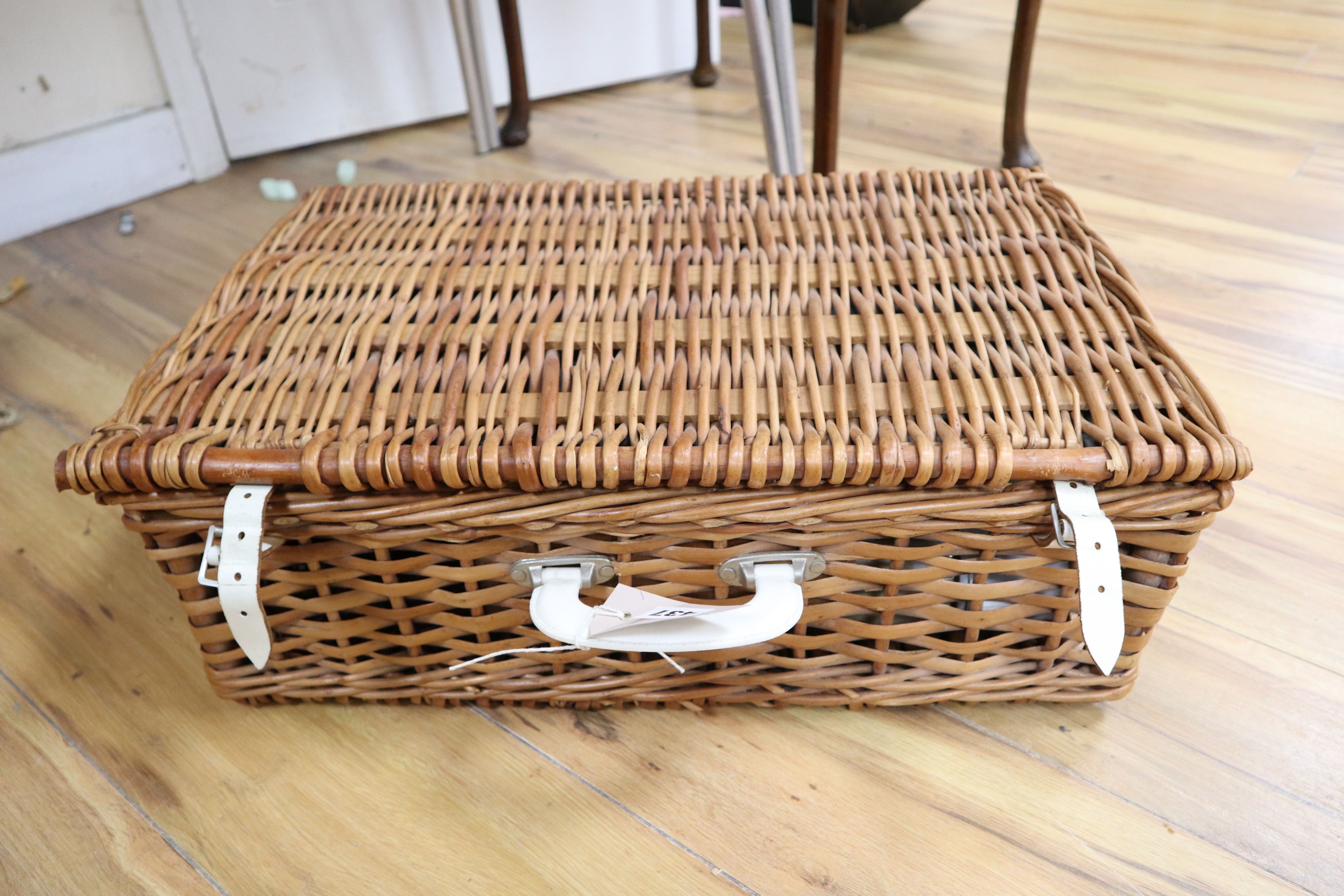 A wicker cased picnic set